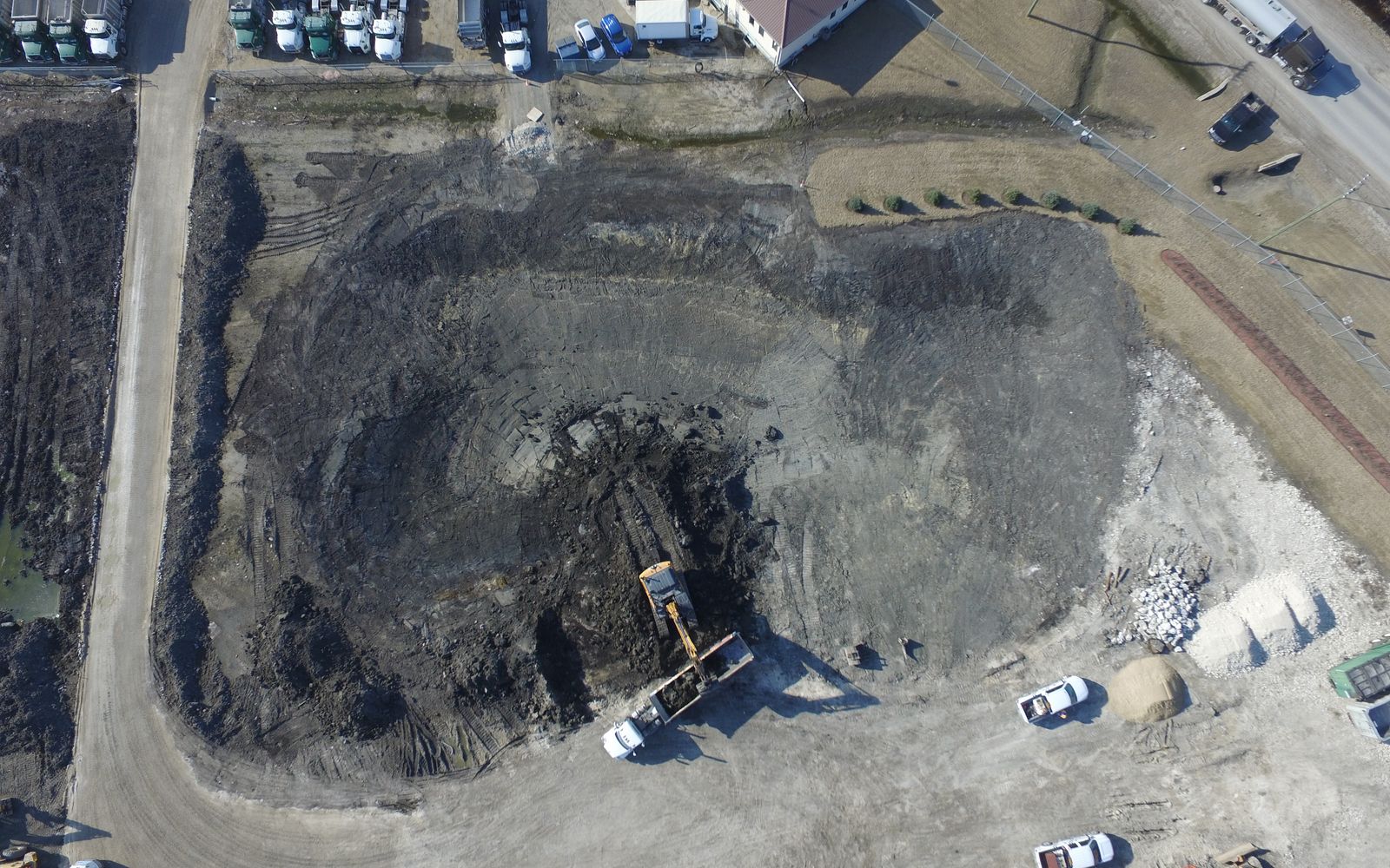 Drone view of a large excavation with the DJN fleet on site