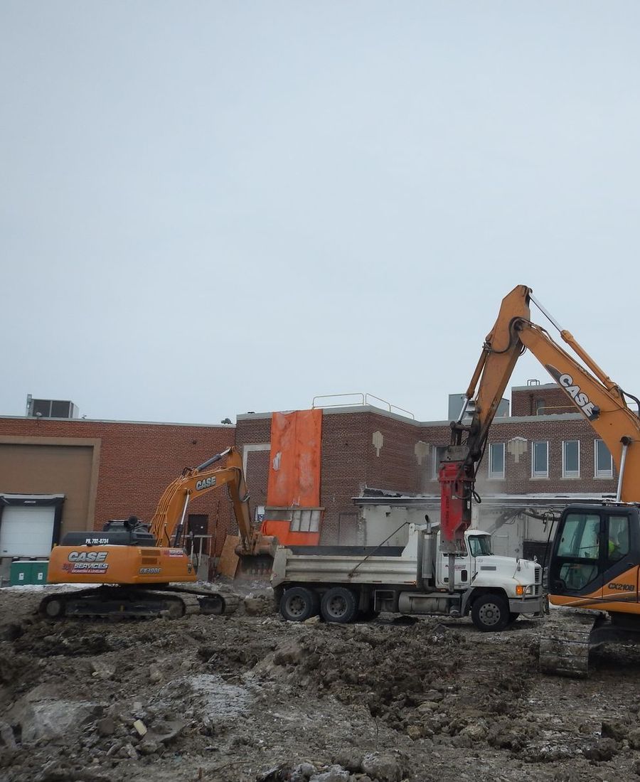 Two DJN excavators on a Winnipeg demolition